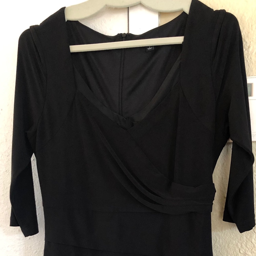 Women’s black dress.
